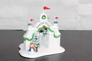 lot B-125 image: Heritage Village Collection North Pole Gate Handpainted Porcelain Accessory