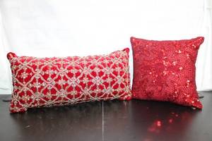 lot 135 image: Set of 2 Red Decorative Pillows with Embellished Designs