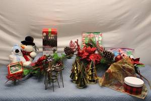 lot 157 image: Christmas Decor Lot including Snowman Plush, Decorative Trees, and Garland
