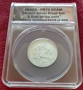 lot 47 image: 2013-S Mount Rushmore Silver Quarter - ANACS PR70 DCAM