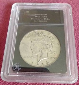 lot 60 image: Slabbed 1935-S Peace Dollar