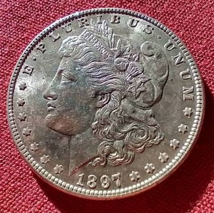 lot 64 image: Beautiful 1897 Morgan Dollar