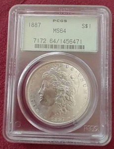 lot 83 image: 1887 Morgan Dollar - PCGS MS64