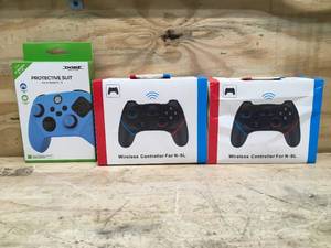 Lot of 2 Wireless Controllers and One Silicone Case