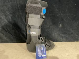 lot 372 image: United Ortho Cam Walker Fracture Boot, Extra Small, Black