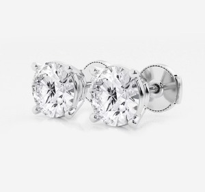 lot 7 image: 4.01 CARAT TOTAL WEIGHT DIAMOND STUD EARRINGS 14K WHITE GOLD 4 PRONG BASKET SET WITH LOCKING BACKS. IGI CERTIFICATION. RETAIL $4399