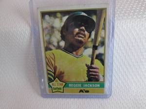 lot 57 image: 1976 Topps Reggie Jackson Card...