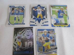 lot 94 image: Justin Herbert  Cards...