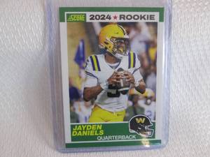 lot 132 image: 2024 Score Jayden Daniels Rookie Ca...
