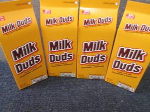 lot 389 image: 4- 10 oz Milk Duds...