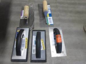 lot 504 image: Grout Floats & Trowels...