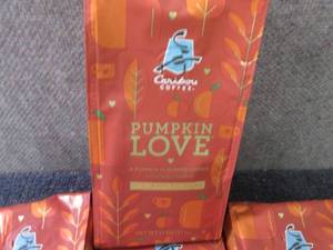 lot 521 image: 4- 11 oz Caribou Coffee Medium Roas...