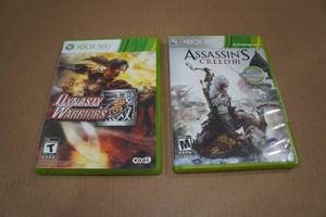 lot 7 image: 2 XBOX 360 Games -Assassins Creed III, Dynasty Warriors 8