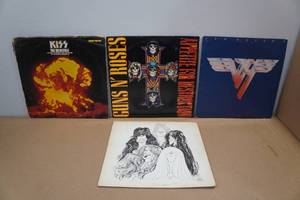 lot 33 image: 4 Vinyl Records -Kiss, Guns N Roses, Van Halen