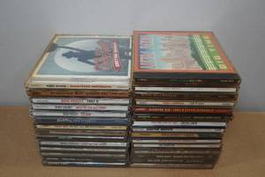 lot 36 image: Assorted Country CDs -Kenny Chesney, Johnny Cash, Toby Keith