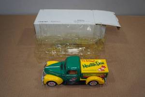 lot 95 image: Golden Wheel Ford 1940 Ya-hooo Mountain Dew Die Cast Model Car
