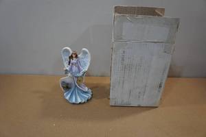 lot 115 image: Angel Statue