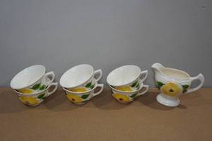lot 194 image: 6 Matching Tea Cups with Creamer