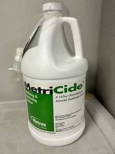 lot 50 image: MetriCide Sterilizing & disinfecting solution 1 Gal Expired