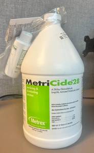 lot 140 image: MetriCide Sterilizing & disinfecting solution 1 Gal Expired