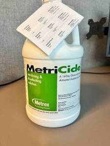 lot 164 image: MetriCide Sterilizing & disinfecting solution Expired