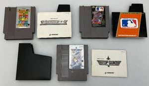 lot 3 image: Vintage 1985 NES Sports Games Including Baseball, Track & Field II & Top Gun, (All With Sleeves And Booklets)