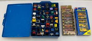 lot 47 image: Misc. Miniature Die-Cast Cars Including HotWheels & More  In Carrying Case (Some NIB)