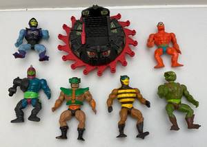 lot 89 image: Misc. 1980s  MOTU Action Figures & 1983 MOTU Roton Vehicle (Missing Pieces)