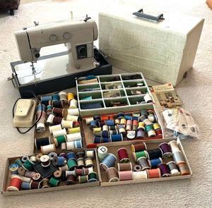 Vintage Signature Sewing Machine with Thread and Buttons