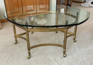 lot 11 image: Vintage Solid Brass Coffee table with a Round Hexagonal Glass Top and Six Claw Feet