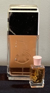Two Bottles of White Shoulders Perfume