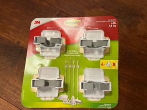 lot 185 image: New 4 Pack of 3M  With Command Pro Strips Broom  Mop Grippers  Wall hangers for Brooms  Mops & Stuff