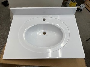 lot 205 image: Design House Cultured Marble Vanity Sink Top, White, 522078 - Minor Damage to one corner see pictures