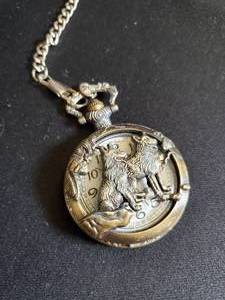 Vintage Silver-Plated Pocket Watch with Lion Design