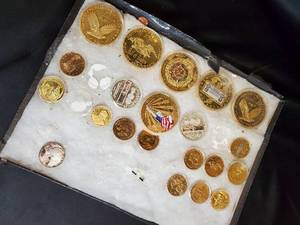Collection of Gold Coins and Medals with Various Designs