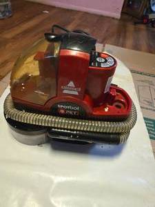 lot 30 image: Bissell Spotbot Pet , Carpet Cleaner (New with one missingbroken plastic cover)