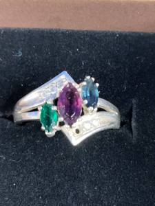 lot 135 image: Rhodium Over Sterling Silver Marquise Synthetic Birthstone Daughters Ring, Retails for $210, Size 8
