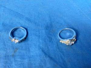 lot 137 image: Two New Stainless Steel CZ Rings Size 7