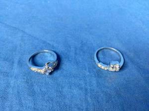 lot 140 image: Two New Stainless Steel CZ Rings Size 10