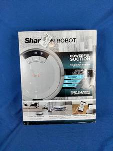lot 203 image: Shark ION RV763 Robot Vacuum, Retails for $300