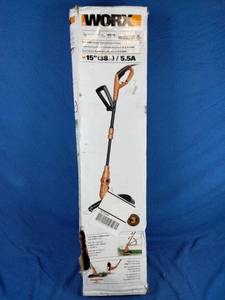 lot 211 image: WORX 15 5.5-Amp Corded Electric Grass TrimmerEdger