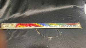lot 16 image: Beach Umbrella with Colorful Design