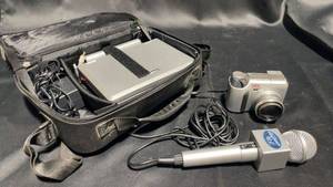 lot 45 image: DVD Player with Microphone and Carrying Case