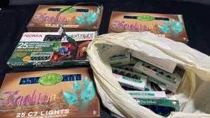 lot 66 image: Lot of 4 Boxes of NOMA C7 Decorative IndoorOutdoor Lights with Miscellaneous C7 Bulbs