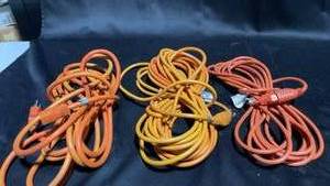 lot 69 image: Lot of 4 Heavy-Duty Extension Cords in Orange and Yellow