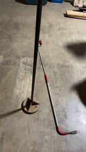 lot 85 image: Commercial Grade Tamper with Bucket and plumbing snake