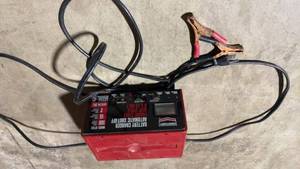 lot 103 image: Century Automatic Shut-Off Battery Charger with Jumper Cables