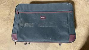 lot 129 image: Used American Tourister Rolling Luggage Suitcase with Wheels