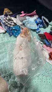 lot 132 image: Vintage Barbie Doll with Assorted Clothing Lot