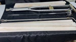 lot 150 image: Lot of 2 Military Canisters (tank round) with Steel Rods and Crutches